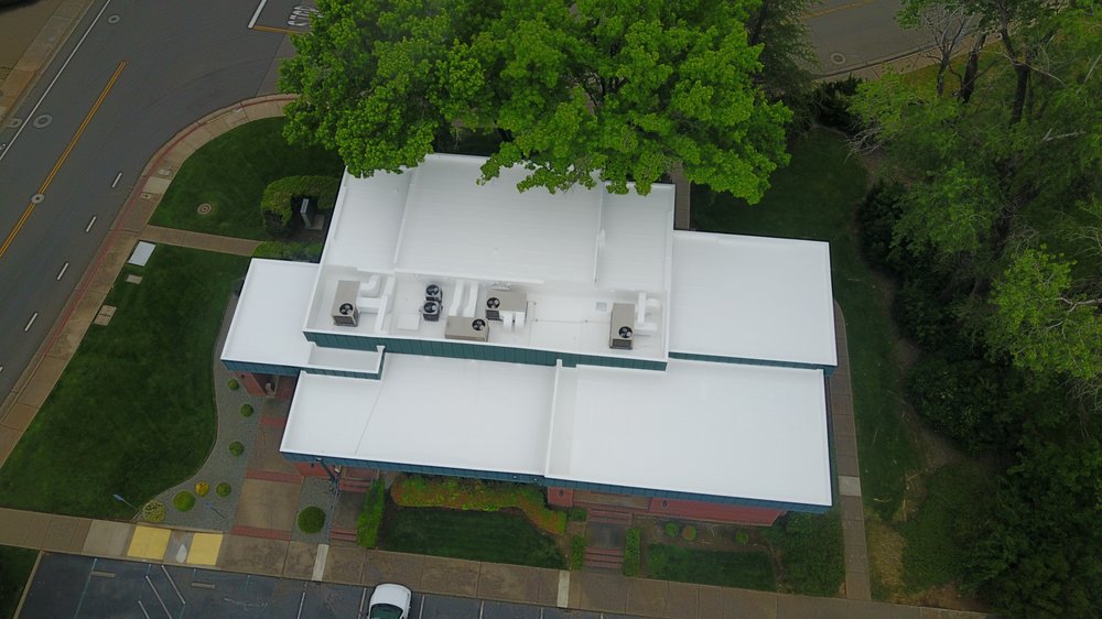 Slide of Mast Roofing