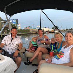 Finney Boat and Watersport Rentals - Heading out for an evening of live music and fireworks