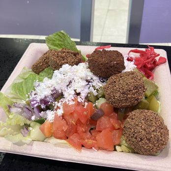 Olive U Mediterranean Grill - His salad bowl with felafel - Mediterranean Near Me - Wellington, Florida Olive U Mediterranean Grill - His salad bowl with felafel - Mediterranean Near Me - Wellington, Florida