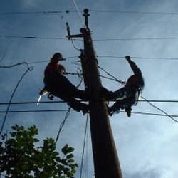 Photo of SCTC - Stayton, OR, US. SCTC Employees on Telephone Pole