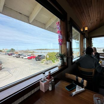The Loft Restaurant & Bar - The view (the parking lot is close, but you can see the boats and water) - Seafood Near Me - Bandon, Oregon The Loft Restaurant & Bar - The view (the parking lot is close, but you can see the boats and water) - Seafood Near Me - Bandon, Oregon