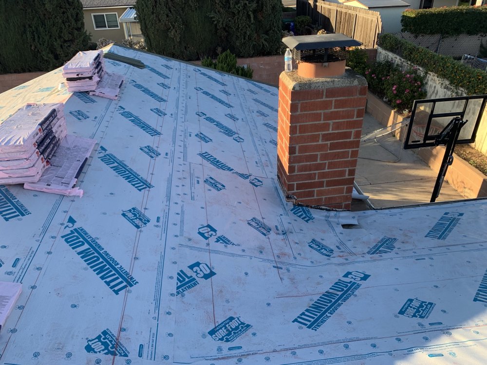 Slide of M G Roofing