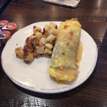 First Watch - Chickichanga with seasoned fruit and potatoes - Breakfast & Brunch Near Me - Miami, Florida First Watch - Chickichanga with seasoned fruit and potatoes - Breakfast & Brunch Near Me - Miami, Florida