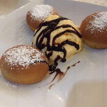 Crawfish Cave - Dessert: beignets with ice cream. Delightful raspberry filling. All the flavors blended together well yet were distinct. - Cajun/Creole Near Me - Fullerton, California