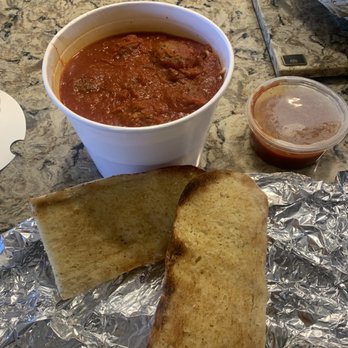 By The Bucket - Spaghetti with meatballs and French bread - Italian Near Me - Tucson, Arizona