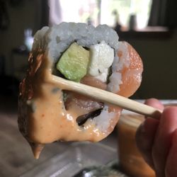 Ojiya Japanese Steakhouse and Sushi Bar - Philadelphia roll with raw salmon in and on top of the roll, cream cheese and avocado.