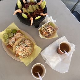 Fish tacos consume and botana negra Fish tacos consume and botana negra