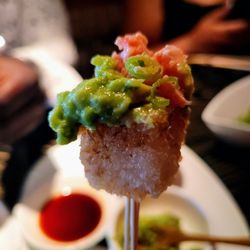 Crispy rice with both tuna and avocado on top