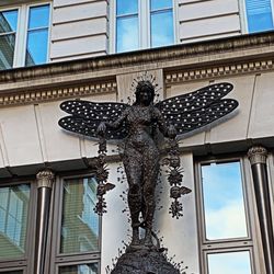 Soho District - SOHO District in the City of Westminster, part of the West End of London. A random art piece on building facade... stunning!