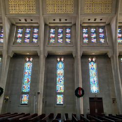 Cathedral of Saint Joseph the Workman - View inside of the east side of the cathedral aside the pews, with beautiful stained glass windows!