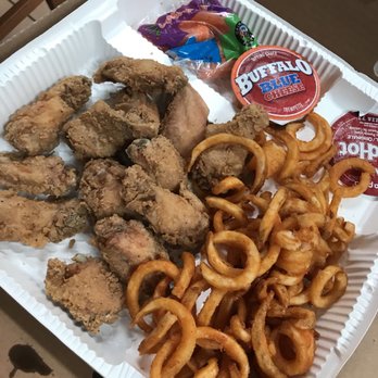 Pizza 73 - a tray of fried chicken, onion rings, and dips - Pizza Near Me - Calgary, Alberta Pizza 73 - a tray of fried chicken, onion rings, and dips - Pizza Near Me - Calgary, Alberta