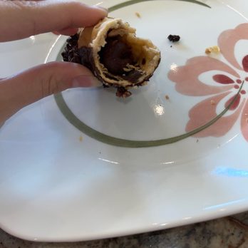 Theresa's Bakery - The center of a cannoli that just had the ends filled. Chocolate cream was not even asked for. - Bakeries Near Me - Cleveland, Ohio Theresa's Bakery - The center of a cannoli that just had the ends filled. Chocolate cream was not even asked for. - Bakeries Near Me - Cleveland, Ohio