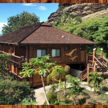 Ka'aha'aina Cafe - This is the building next to the cafe that I just fell in love with. Cute whales. Such beautiful wood work!! - Seafood Near Me - Waianae, Hawaii