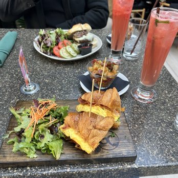 Glass Ceiling Rooftop - Croissant sandwhich with bacon, angus burger, potatoes, watermelon drink - Lounges Near Me - New York, New York Glass Ceiling Rooftop - Croissant sandwhich with bacon, angus burger, potatoes, watermelon drink - Lounges Near Me - New York, New York