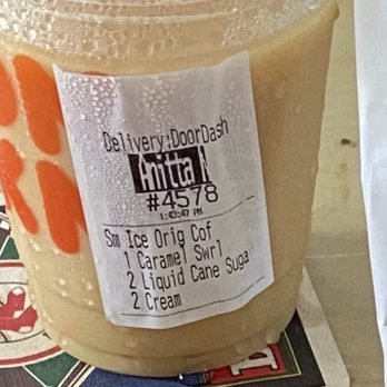 Dunkin' - a drink in a plastic cup on a table - Donuts Near Me - Narragansett, Rhode Island Dunkin' - a drink in a plastic cup on a table - Donuts Near Me - Narragansett, Rhode Island