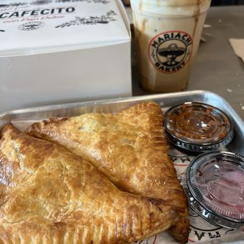 Mariachi Bakery - Empanada - Tinga de Pollo & Iced Besito de leche iced latte - Bakeries Near Me - Downey, California Mariachi Bakery - Empanada - Tinga de Pollo & Iced Besito de leche iced latte - Bakeries Near Me - Downey, California
