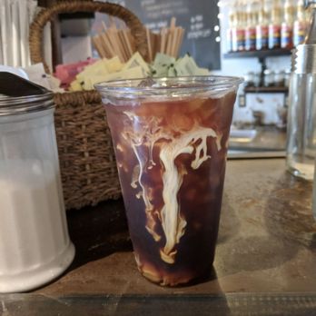 Fair Trade Cafe - Iced Americano as the cream melts through - Coffee & Tea Near Me - Phoenix, Arizona