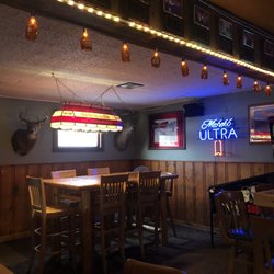 The Other Place - Cold drinks, bar made pizza, and great company.