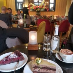 Das Eis Café - Tasty cakes (chocolate and cherry torte left, Amadeus chocolate mousse with marzipan right) in a pleasant but a little dated space