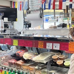 Super Mercado La Villa - Menu behind counter