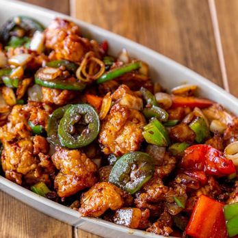 Tony's Chinese Food - a dish of chicken and vegetables - Chinese Near Me - Chicago, Illinois Tony's Chinese Food - a dish of chicken and vegetables - Chinese Near Me - Chicago, Illinois