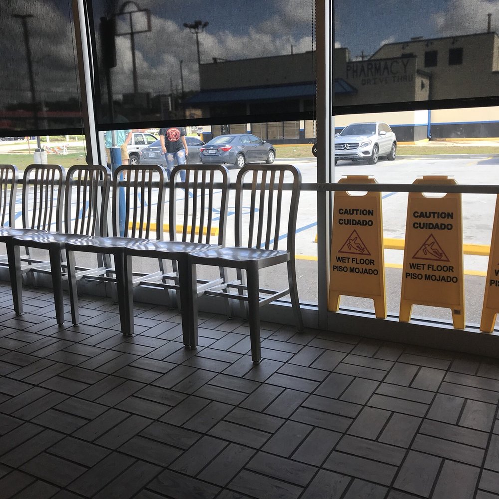 Waffle House - a row of chairs in front of a window - Breakfast & Brunch Near Me - Baker, Louisiana