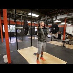 Crossfit Superfly - Brian Miller, coach and owner at Crossfit Superfly, demonstrates a front rack position.