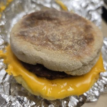 Death by Donutz - The Beaver breakfast sandwich (sausage, egg, cheese, house sauce on English muffin) - Donuts Near Me - Corvallis, Oregon