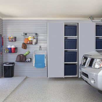 Garage Storage Solutions - Silver Garage Cabinets with sliding doors and slatwall. - Cabinetry Near Me Garage Storage Solutions - Silver Garage Cabinets with sliding doors and slatwall. - Cabinetry Near Me