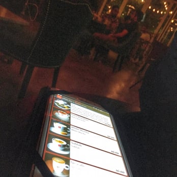 Cloud Lounge - There menu on a tablet and you can call the waiter buy a button so no shouting when they have someone playing music - Lounges Near Me - Arlington, Virginia