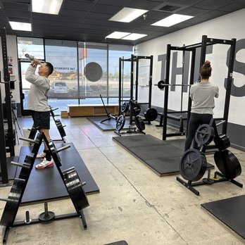 The Strength Co. - Costa Mesa - Husband and wife getting a workout in. - Trainers Near Me - Costa Mesa, California The Strength Co. - Costa Mesa - Husband and wife getting a workout in. - Trainers Near Me - Costa Mesa, California
