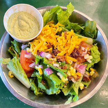 Rodeo Goat - Rodeo Side Salad with avocado ranch - Burgers Near Me - Houston, Texas Rodeo Goat - Rodeo Side Salad with avocado ranch - Burgers Near Me - Houston, Texas