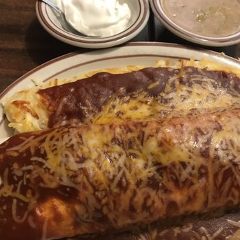 Weck's - Chicken breakfast burrito smothered in red chili sauce with the green chili sauce on side with side of sour cream - Breakfast & Brunch Near Me - Rio Rancho, New Mexico