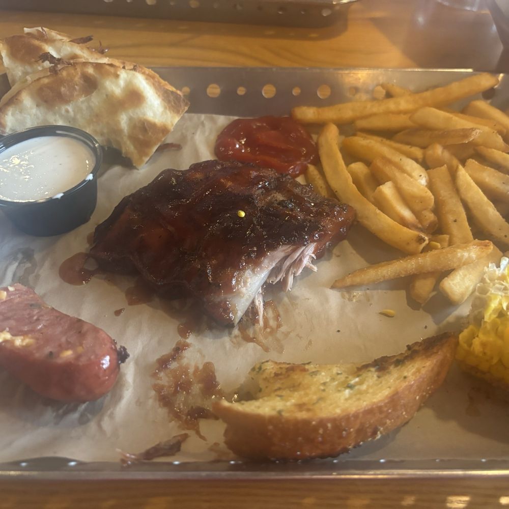 Ultimate Smokehouse Combo with Ribs, Jalapeño Sausage, Brisket Quesadilla Ultimate Smokehouse Combo with Ribs, Jalapeño Sausage, Brisket Quesadilla
