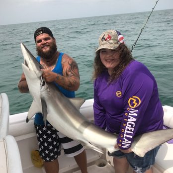 Get Hooked Fishing Charters - Courtney and Captain Spike with her shark! - Boat Charters Near Me - Galveston, Texas Get Hooked Fishing Charters - Courtney and Captain Spike with her shark! - Boat Charters Near Me - Galveston, Texas