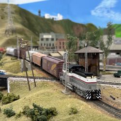 Golden State Model Railroad Museum - HO C-415 diesel running across a replica of Niles Junction, CA.