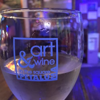 Vine & Barrel - a glass of wine on a table - Beer, Wine & Spirits Near Me - Petaluma, California Vine & Barrel - a glass of wine on a table - Beer, Wine & Spirits Near Me - Petaluma, California