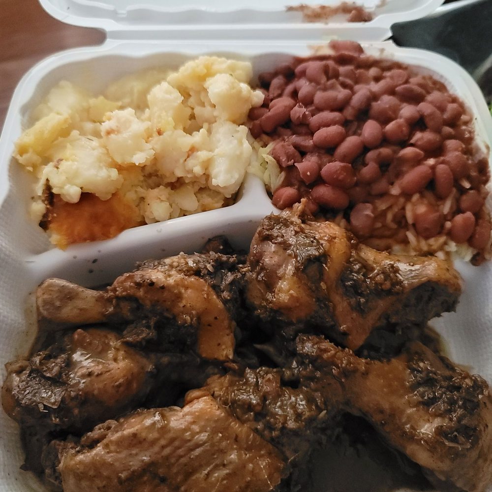 Ruthies Caribbean Kitchen - Hot jerk chicken wings, red beans & rice, scalloped potatoes. - Caribbean Near Me - Vallejo, California