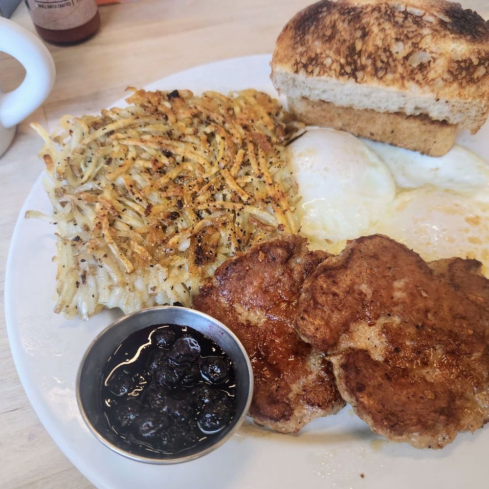 Matt's Big Breakfast Gilbert - Chicken & pig (2 eggs over easy, crispy hash browns, sausage patties & sourdough toast with house made blueberry preserves. - Breakfast & Brunch Near Me - Gilbert, Arizona