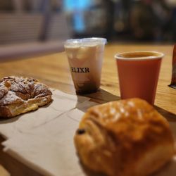 Elixr Coffee Roasters - Cappuccino and chocolate pastry