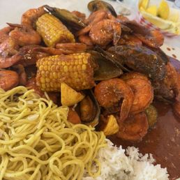 2lbs Shrimp, 1lb Mussels, Sausage, Corn, Garlic Noodles, And Steamed Rice 2lbs Shrimp, 1lb Mussels, Sausage, Corn, Garlic Noodles, And Steamed Rice