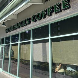 Adjacent to Walmart, store front faces Keeamoku Street