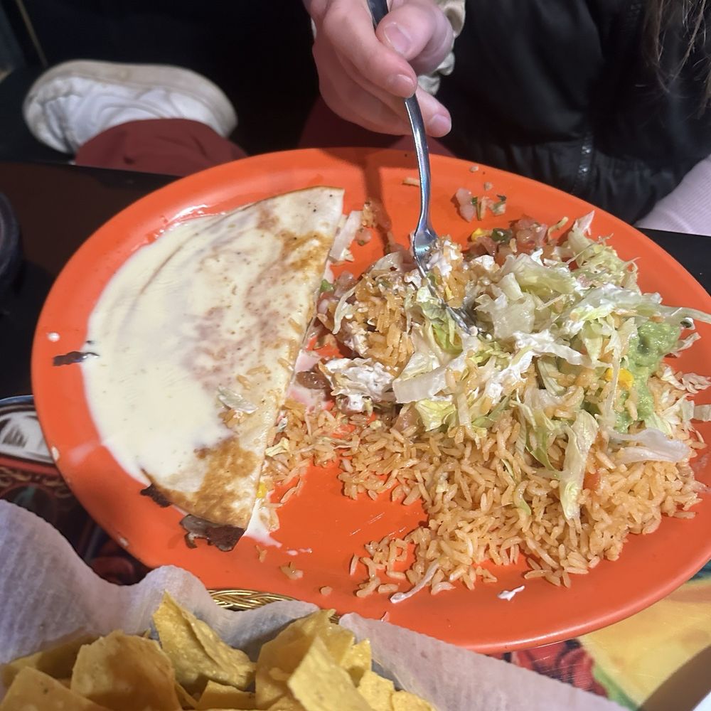 Taco Tequila Bar - Cheese quesadilla that comes with side of rice, lettuce, tomato, sour cream, and guacamole. Also comes with queso on the top. - Mexican Near Me - Hillsboro, Missouri Taco Tequila Bar - Cheese quesadilla that comes with side of rice, lettuce, tomato, sour cream, and guacamole. Also comes with queso on the top. - Mexican Near Me - Hillsboro, Missouri