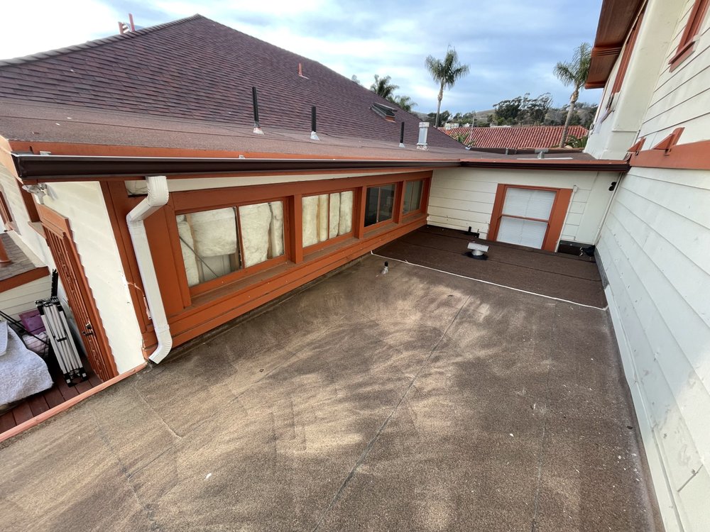 Slide of El Puma Roofing