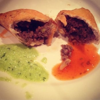 Empanada Mama - Hell's Kitchen - Brasil empanada with creamy chimichurri & spicy red sauces - Latin American Near Me - New York, New York Empanada Mama - Hell's Kitchen - Brasil empanada with creamy chimichurri & spicy red sauces - Latin American Near Me - New York, New York