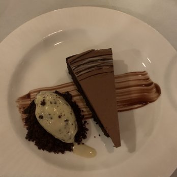 Grouse Mountain Grill - Flourless chocolate cake and homemade mint chip ice cream - New American Near Me - Avon, Colorado Grouse Mountain Grill - Flourless chocolate cake and homemade mint chip ice cream - New American Near Me - Avon, Colorado