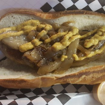 King's  Sausage - Beer brats ($8) on pretzel roll with caramelized onions, mustard, and side of chipotle sauce - Food Trucks Near Me
