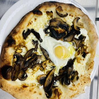Erica Wood Fire Bistro & Raw Bar - a mushroom and egg pizza - Pizza Near Me - Pendleton, South Carolina Erica Wood Fire Bistro & Raw Bar - a mushroom and egg pizza - Pizza Near Me - Pendleton, South Carolina