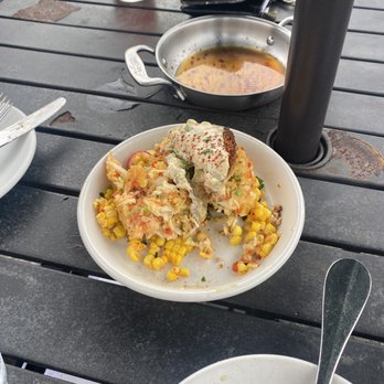 Parish Restaurant & Bar - Crab and Crawfish cake over corn salad - New American Near Me - Monroe, Louisiana Parish Restaurant & Bar - Crab and Crawfish cake over corn salad - New American Near Me - Monroe, Louisiana
