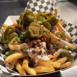 Ryder’s Chicken & Biscuits  - Loaded Fries- Nacho Cheese, Ranch, Hot Chick Sauce, Bacon, Jalapeños, Scallions